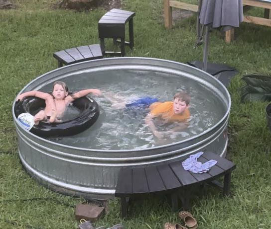 Cooling off in the cowboy stock tank pool!