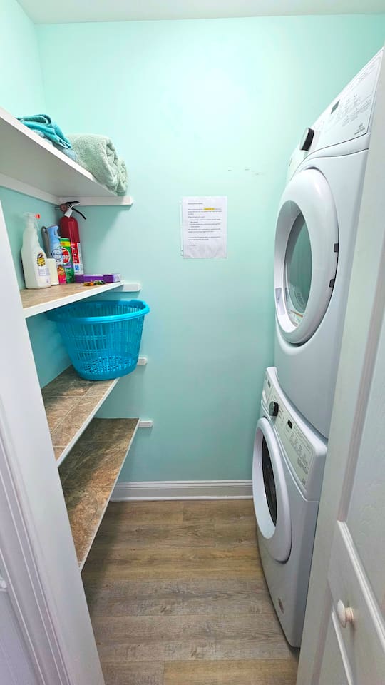 laundry room washer and dryer. Laundry pods provided.