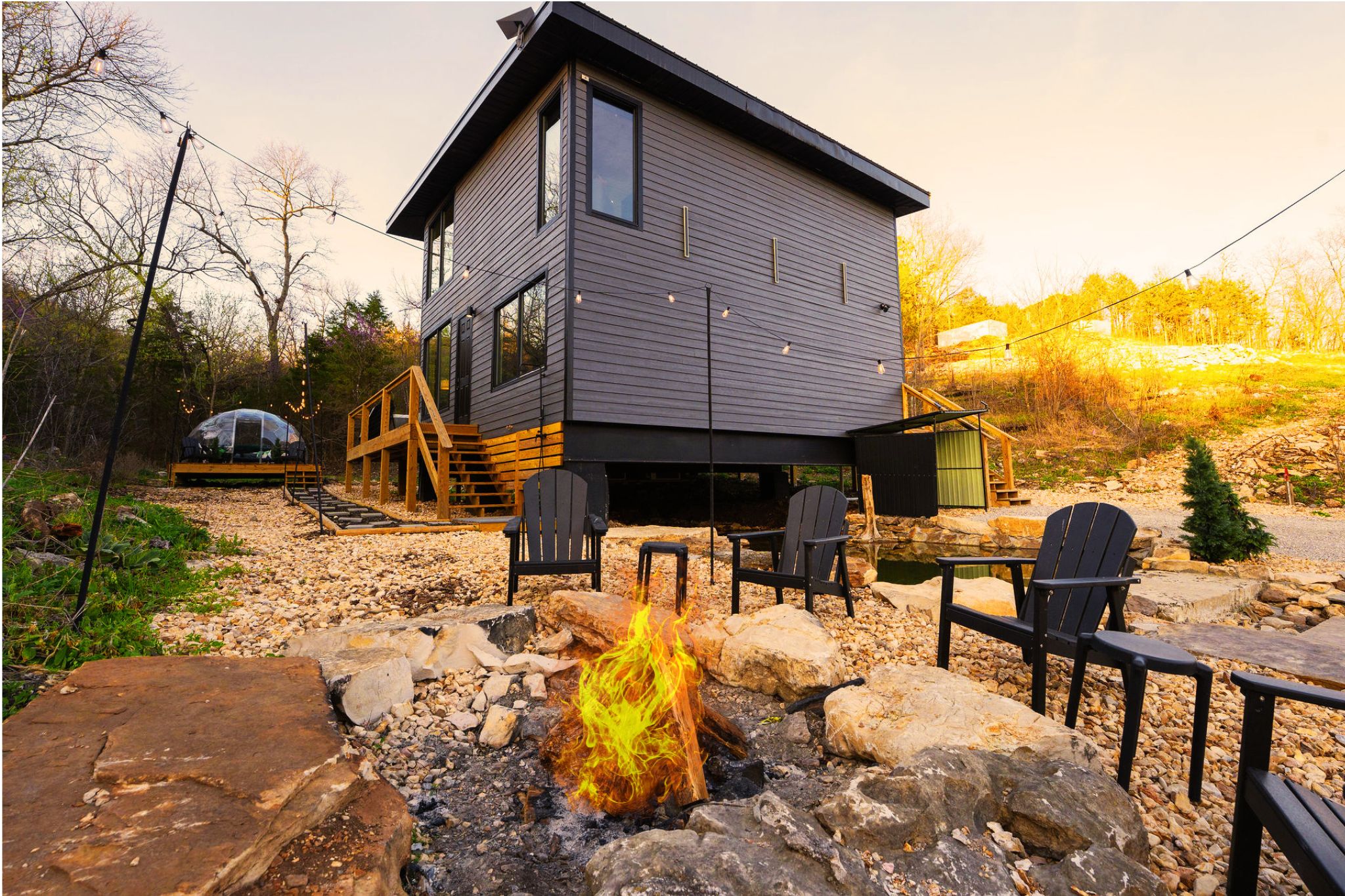 Outdoor Firepit Lounge: Cozy up around the fire, crafted with native stone from the property. Firewood is provided for guest use and we also have s'mores sticks in the kitchen!