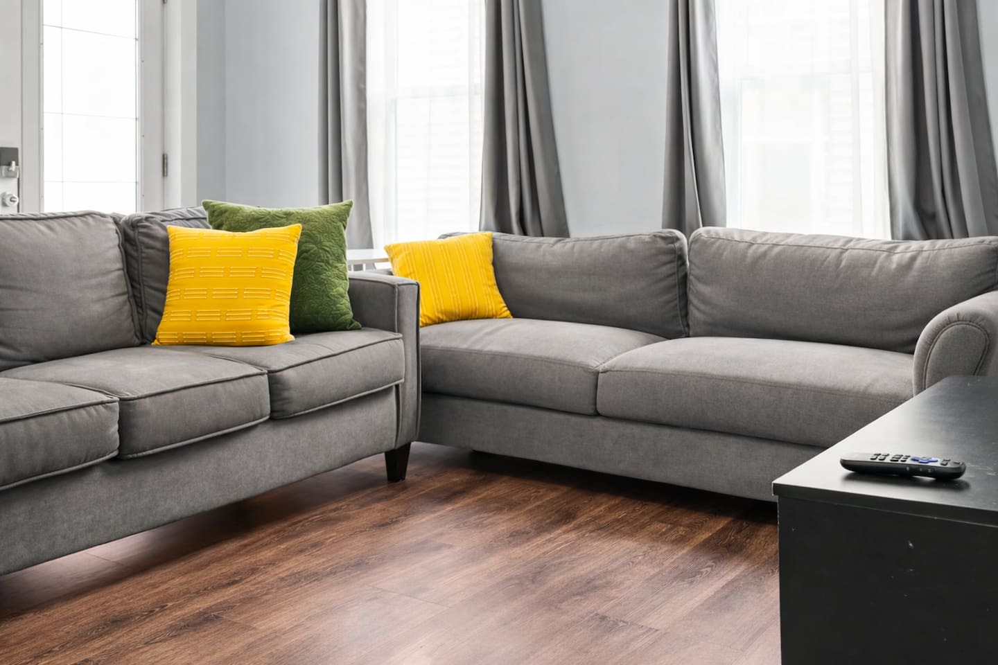 Spacious seating arrangement perfect for movie nights, conversations, or unwinding after a day exploring the city.