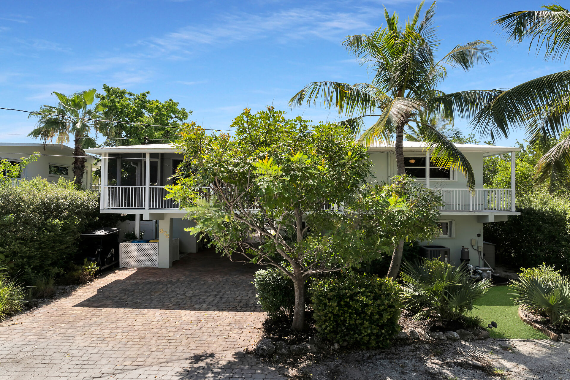 Front view of home. Parking for 2 vehicles and boat trailer.