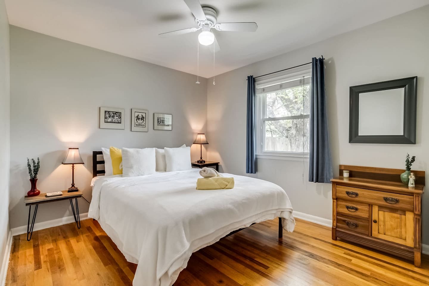 Bright, Comfortable & Inviting ☀️

This charming second bedroom features beautiful hardwood floors, plenty of natural light, and a ceiling fan to keep things comfortable. A cozy, welcoming space to relax and recharge after a day of adventures.