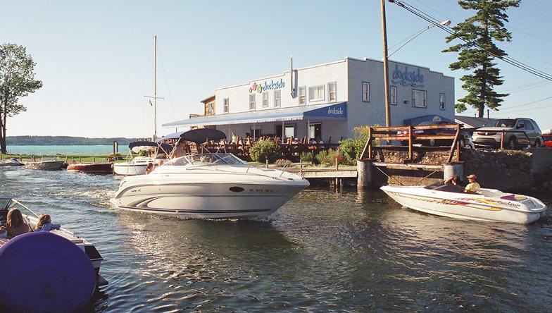 The Dockside Restaurant is the place to be to see what's happening on Torch Lake.