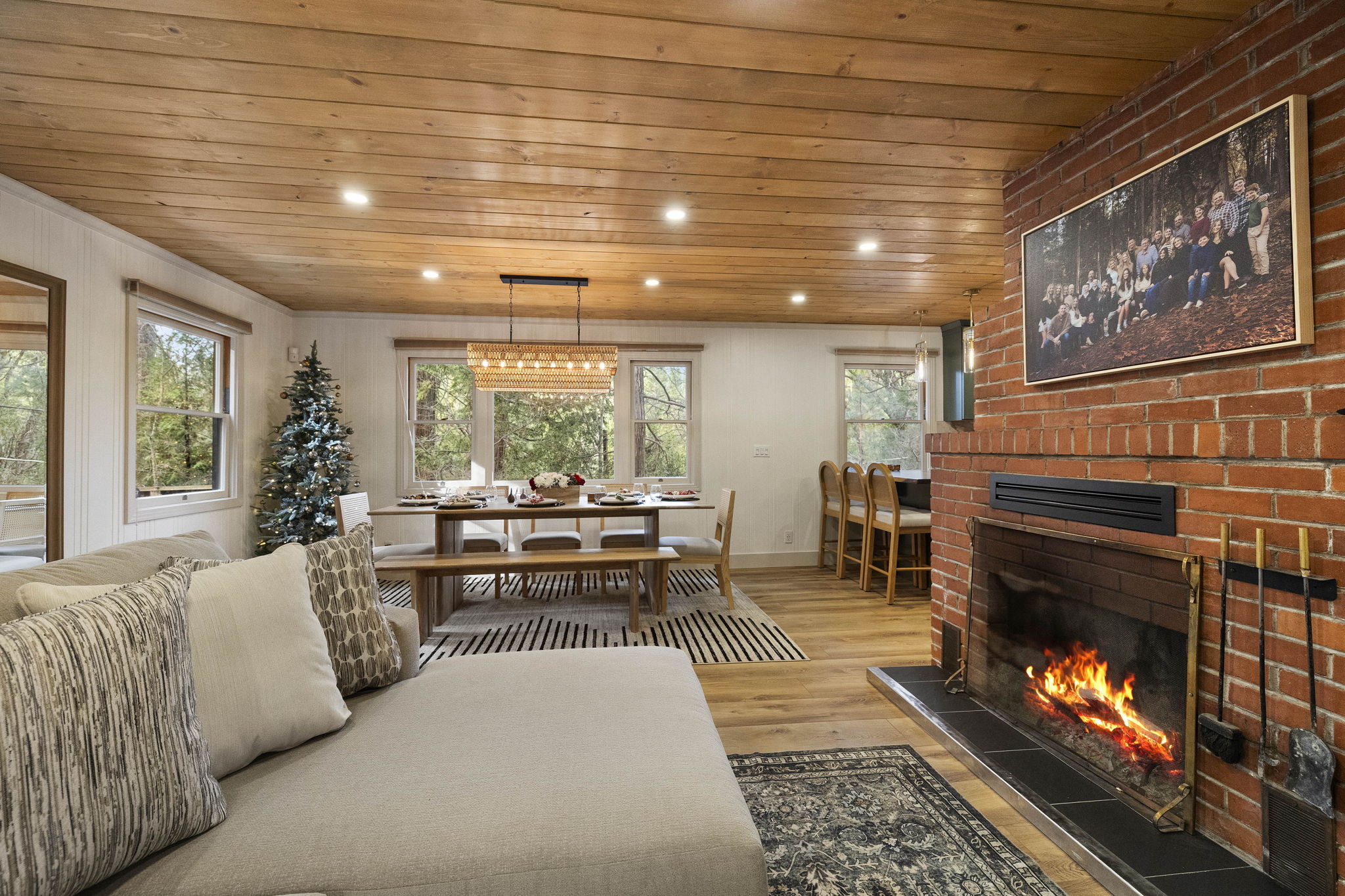 Open concept living with a combined living room, dining room and kitchen. Just enough division to feel like separate spaces and the perfect amount of openness to all be together.