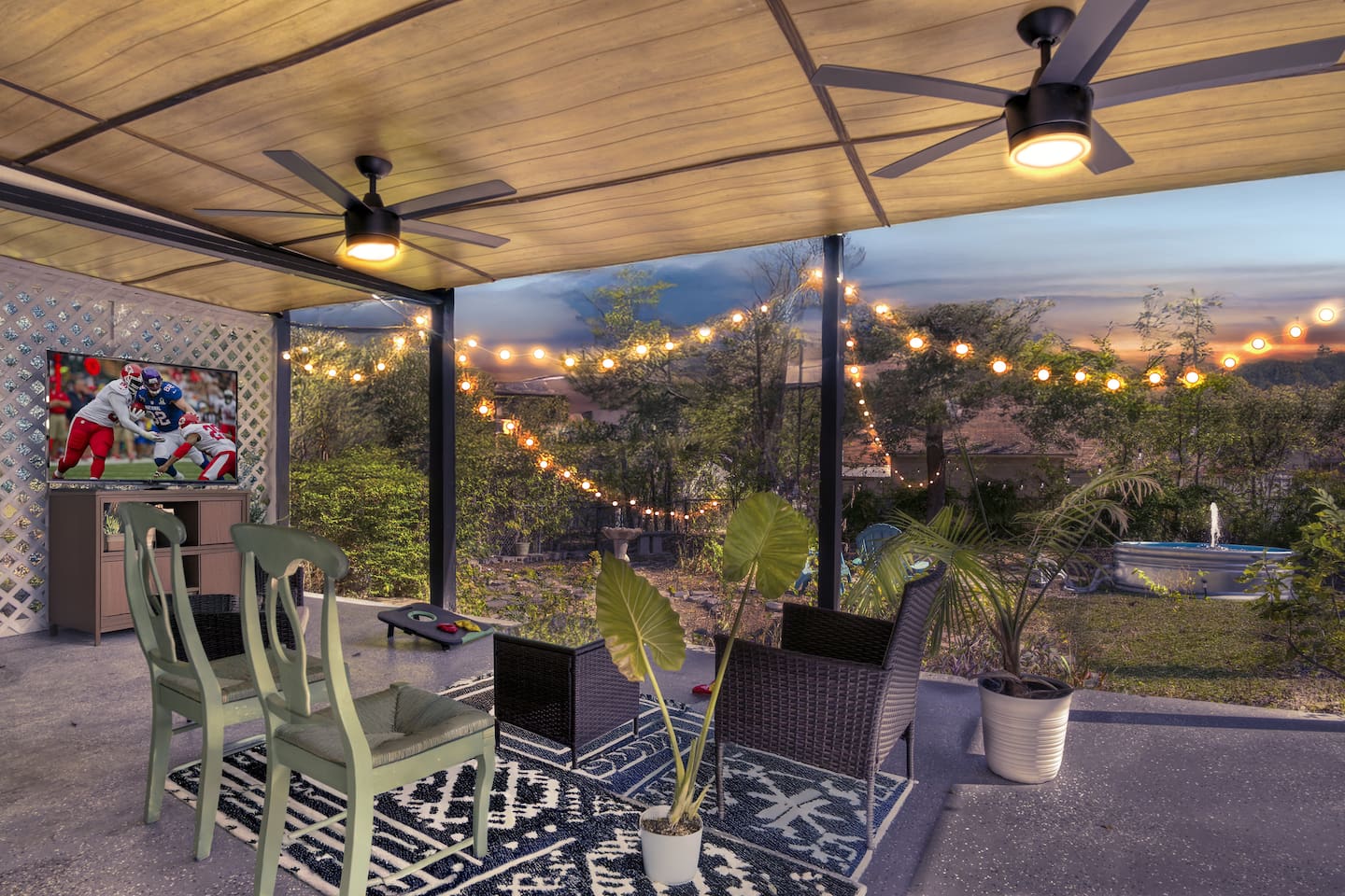 watch movie at our covered patio overlooking a garden