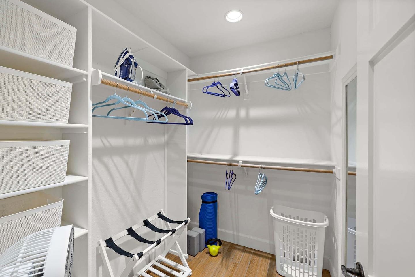 Master Bedroom Closet with plenty of storage, workout equipment and baby gear stored here.