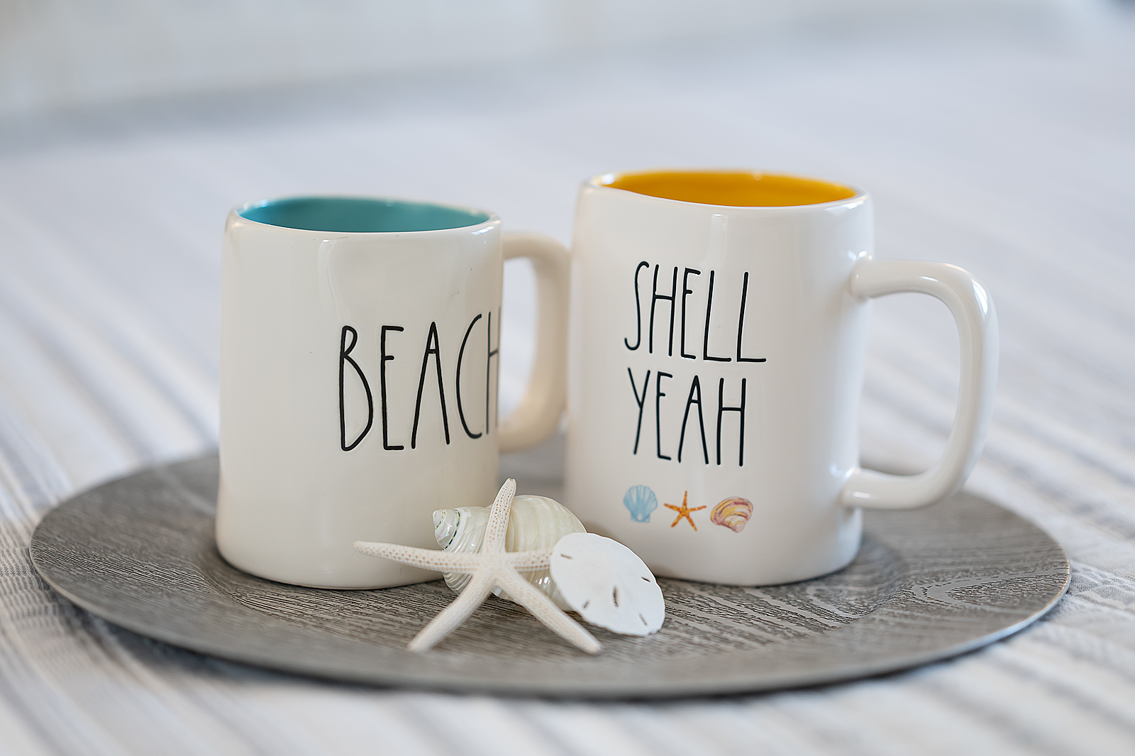 coffee tastes better at the beach, especially in one of our beach Rae Dunn mugs