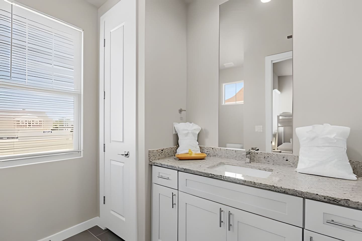 Modern and clean, this bathroom offers all the essentials for a refreshing start to your day.