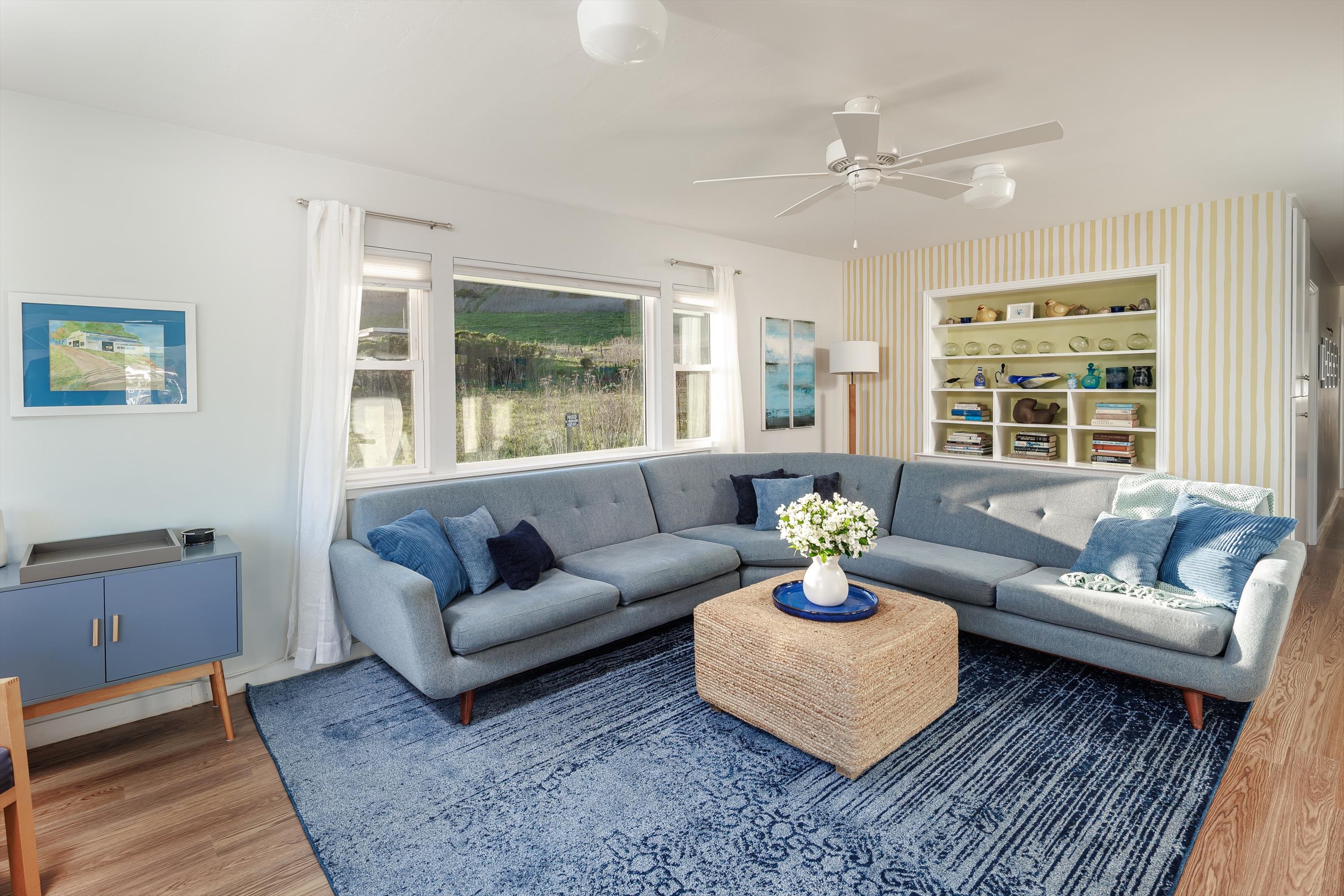 A bright, welcoming living room perfect for family time, movie nights, and unwinding after a day of adventure.