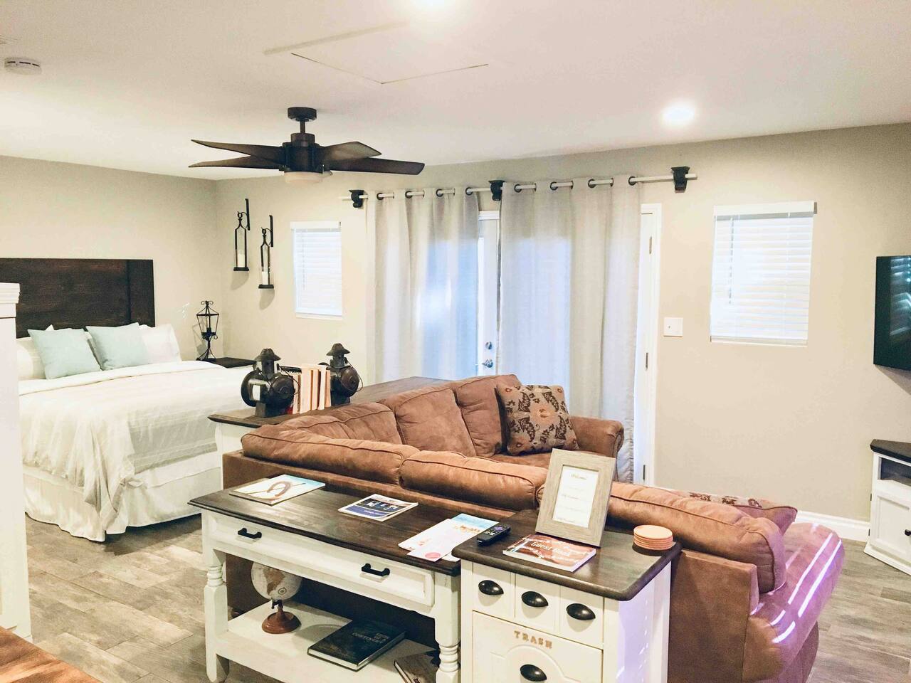 Cozy Blue Cottage interior with king bed and minisplit AC