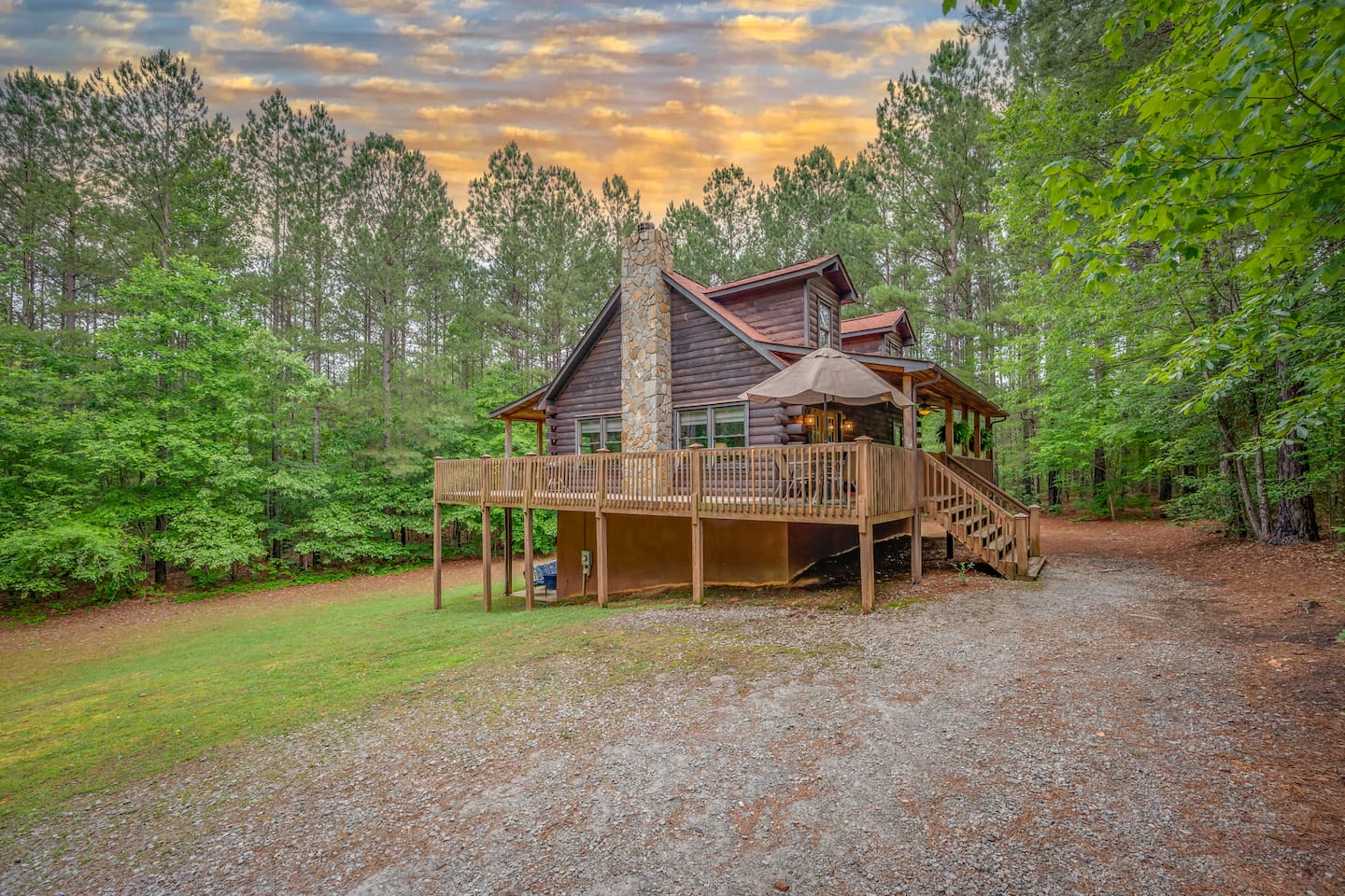 Large 3 story log cabin in private setting on acres of woods, minutes from town