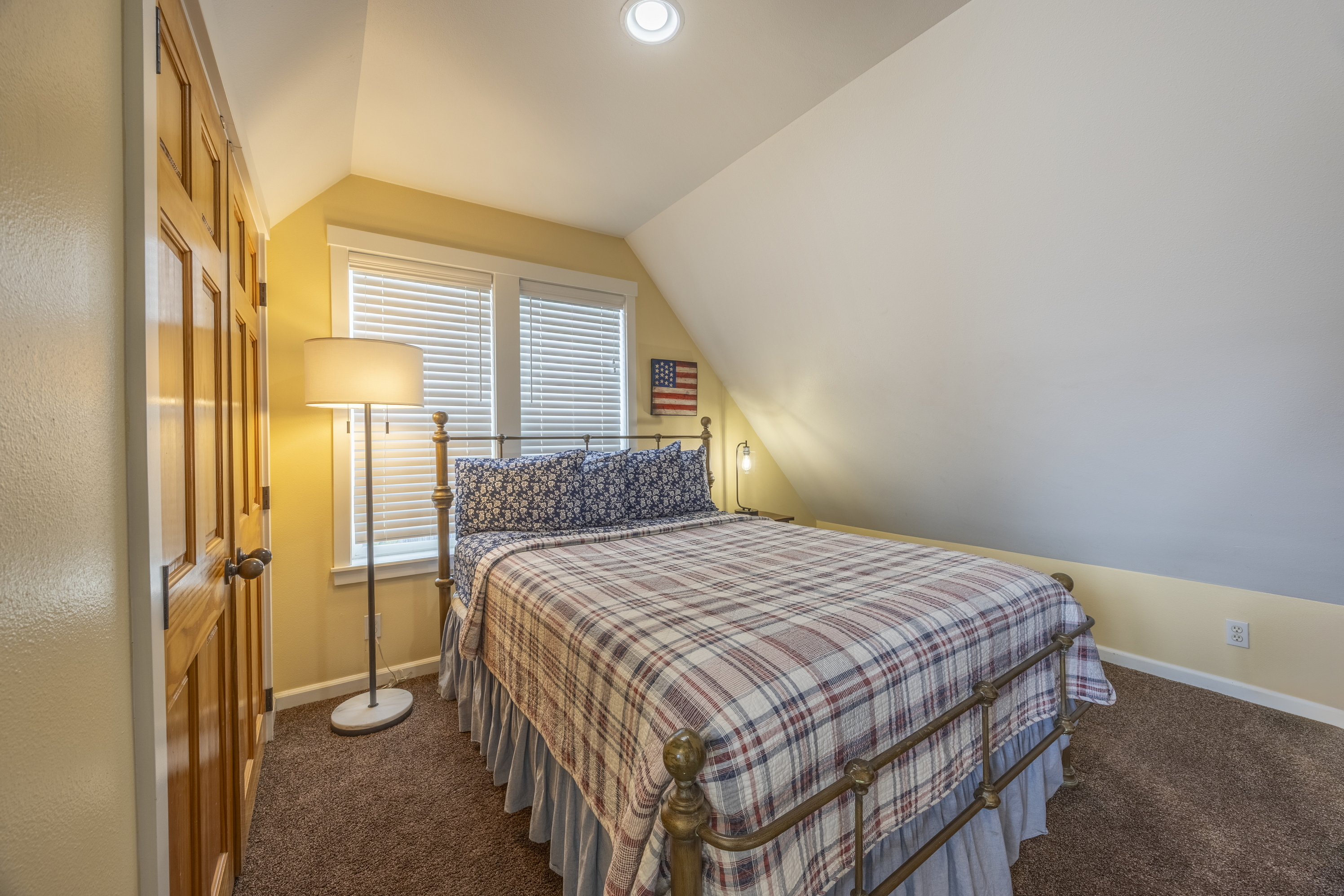 Soft, inviting quilts make the queen bedroom the perfect place to recharge after a day at the beach.