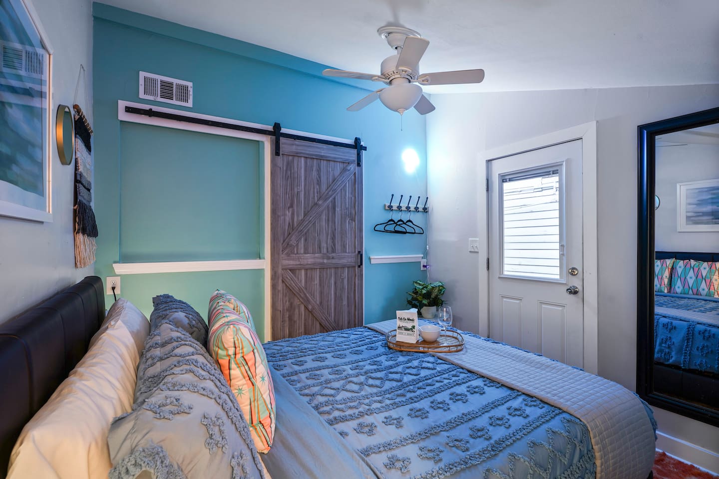 Snuggle up in the Blue Room for a deep, relaxing rest. Queen bed, plenty of pillows, ceiling fan, full-length mirror, and hangers.
