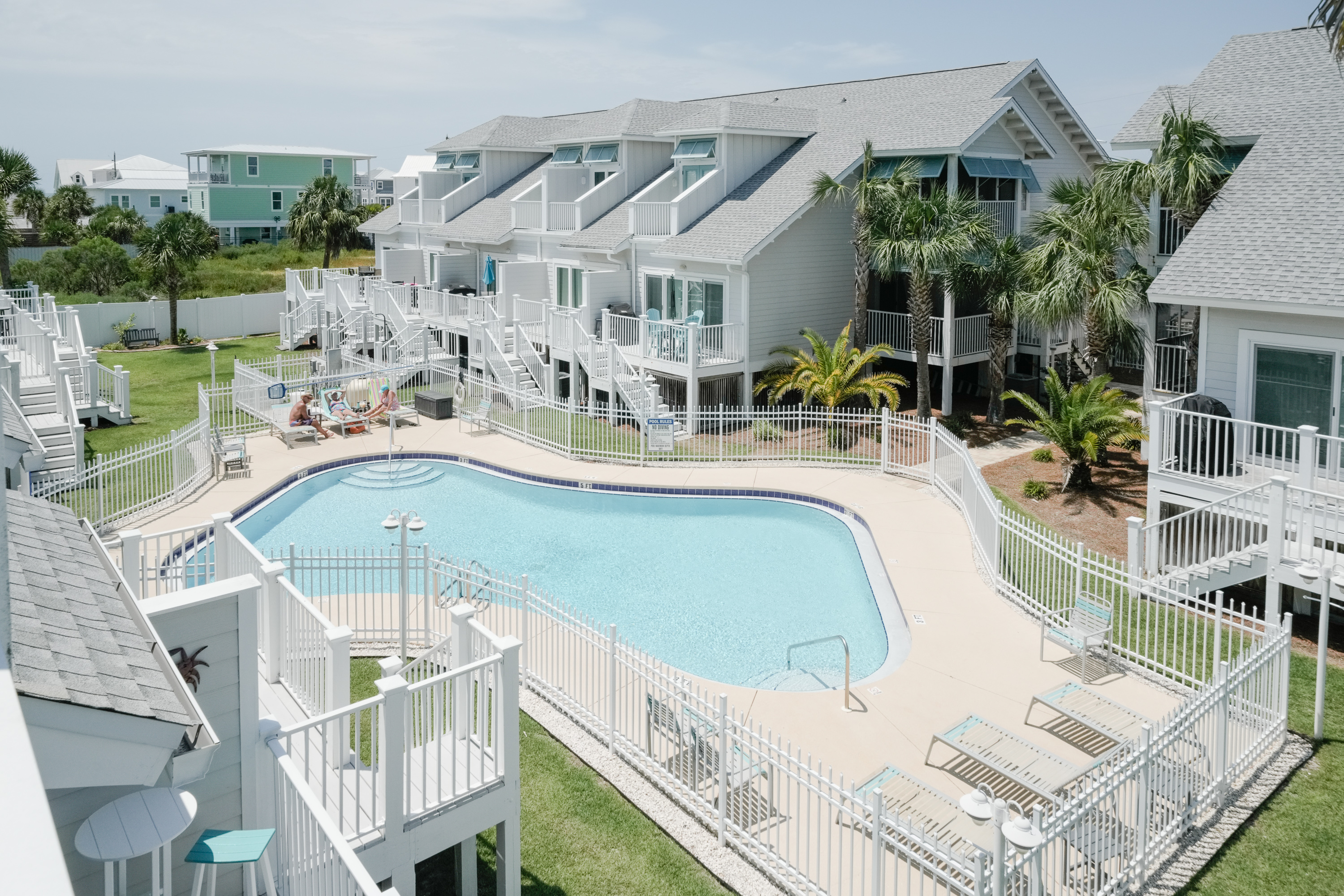 Spend your days enjoying the sparkling community pool just steps from the townhome