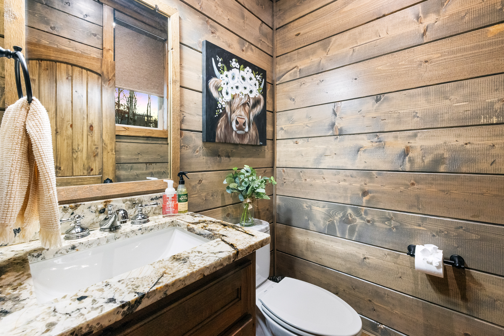 Charming rustic vanity space with handcrafted cabin details