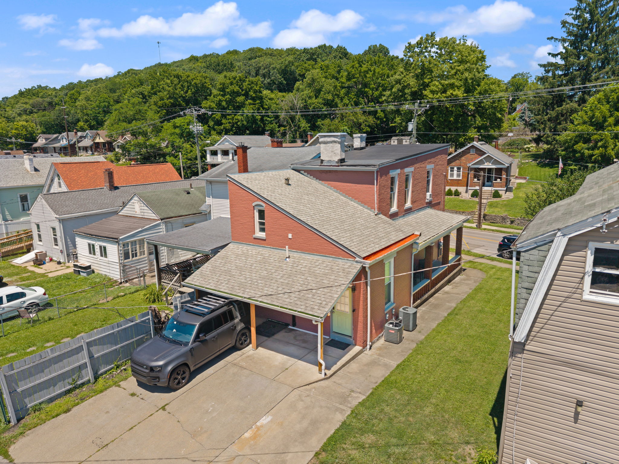 Aerial view showcasing the property’s prime location in a residential neighborhood