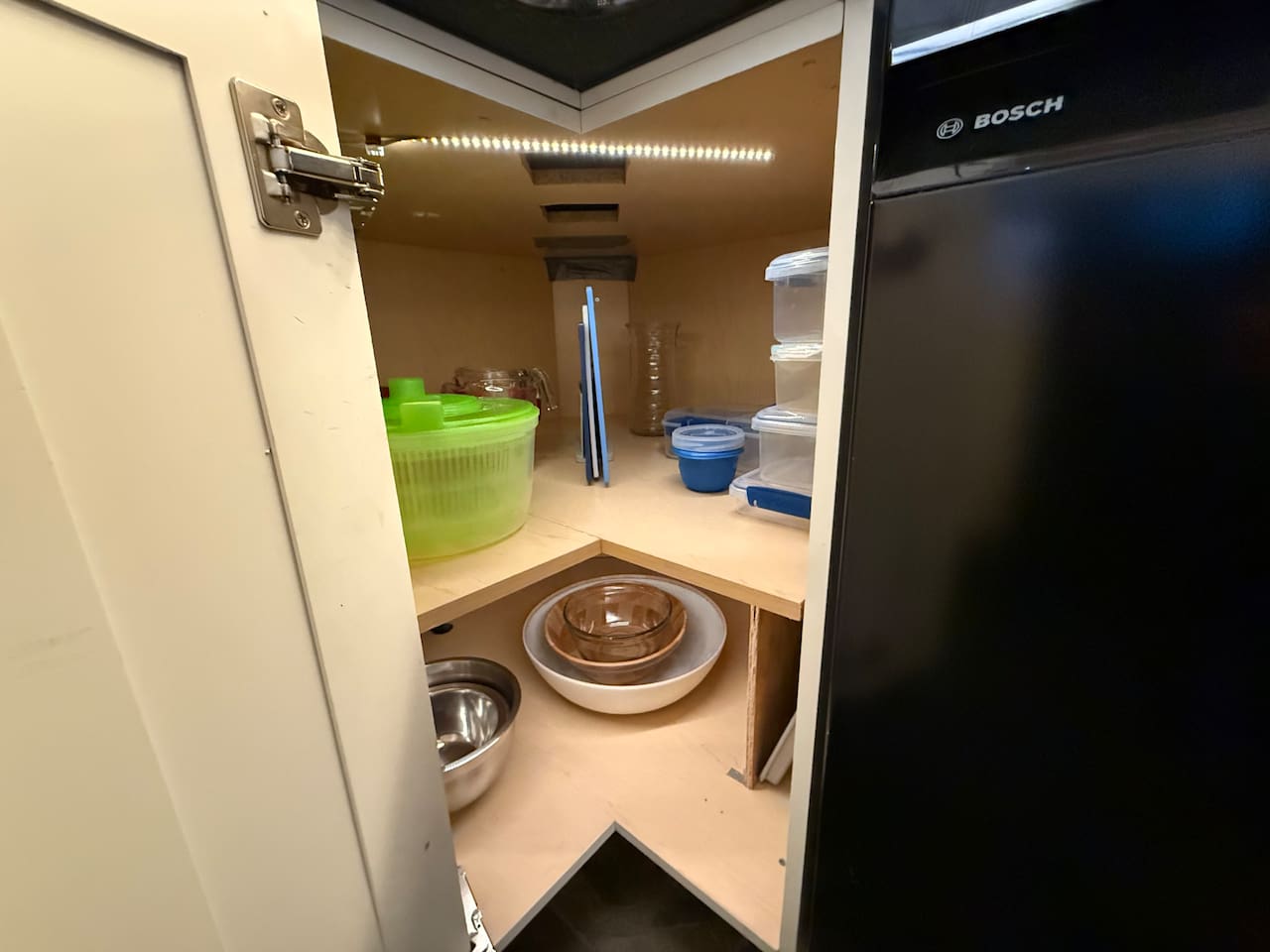 Cabinet Storage: Deep cabinet space is perfect for storing pots, pans, and plastic food containers, keeping the kitchen tidy and organized.