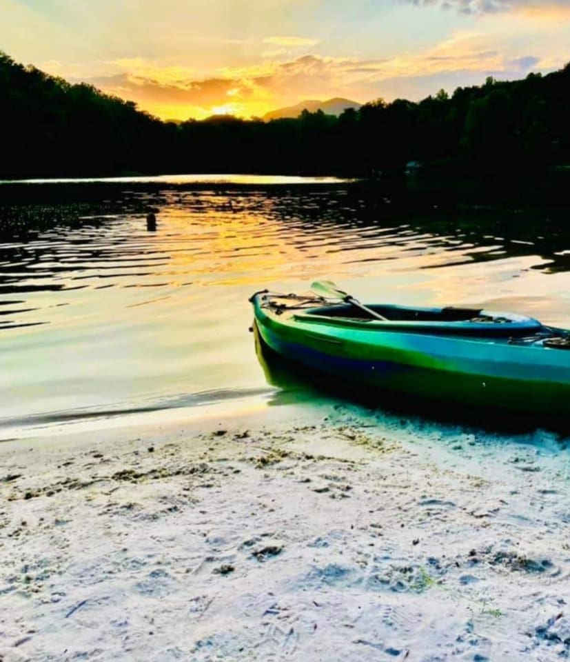Our private beach- canoes and kayaks come with the cabin rental.