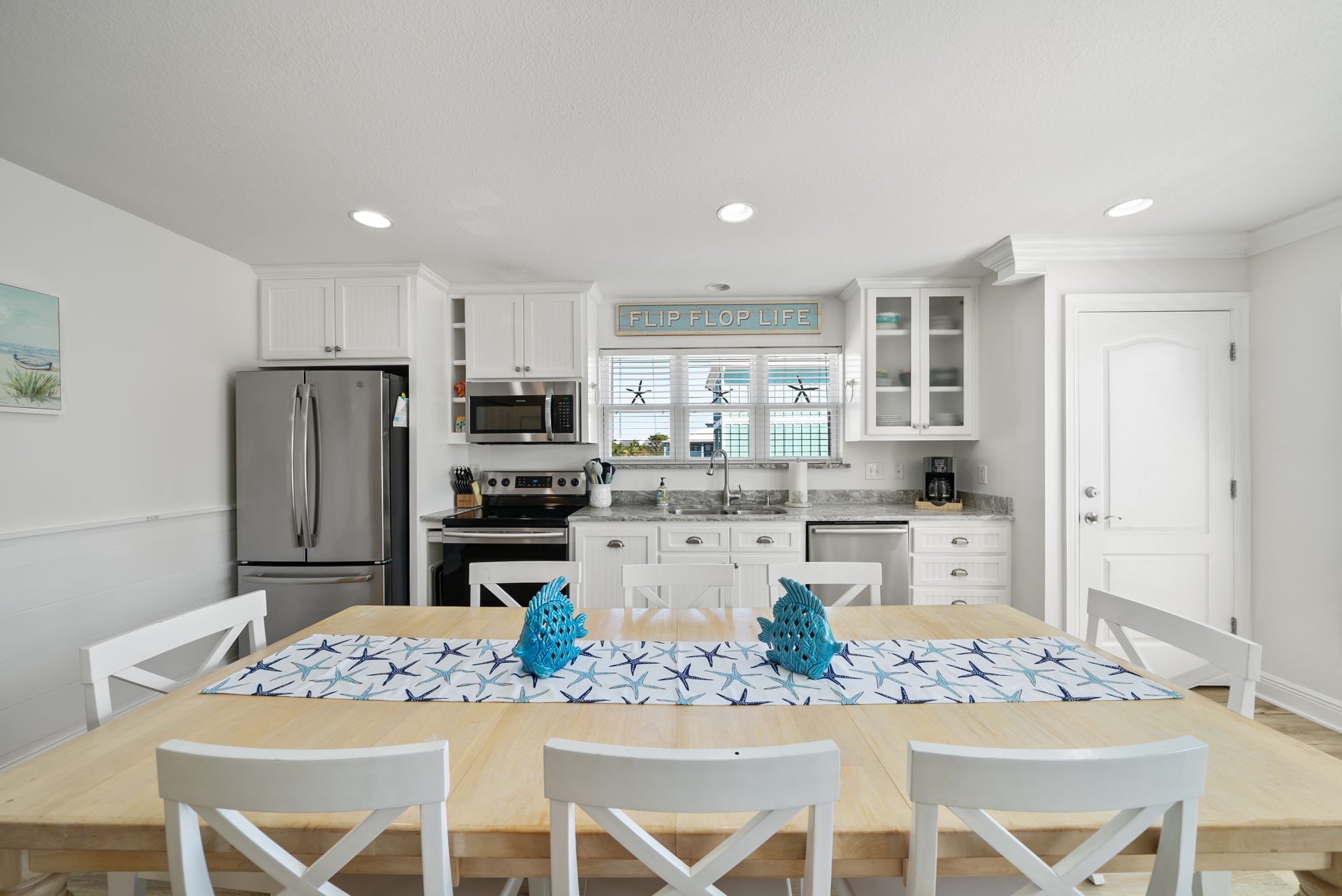 Large dining room table and chairs. Easily seating 8.