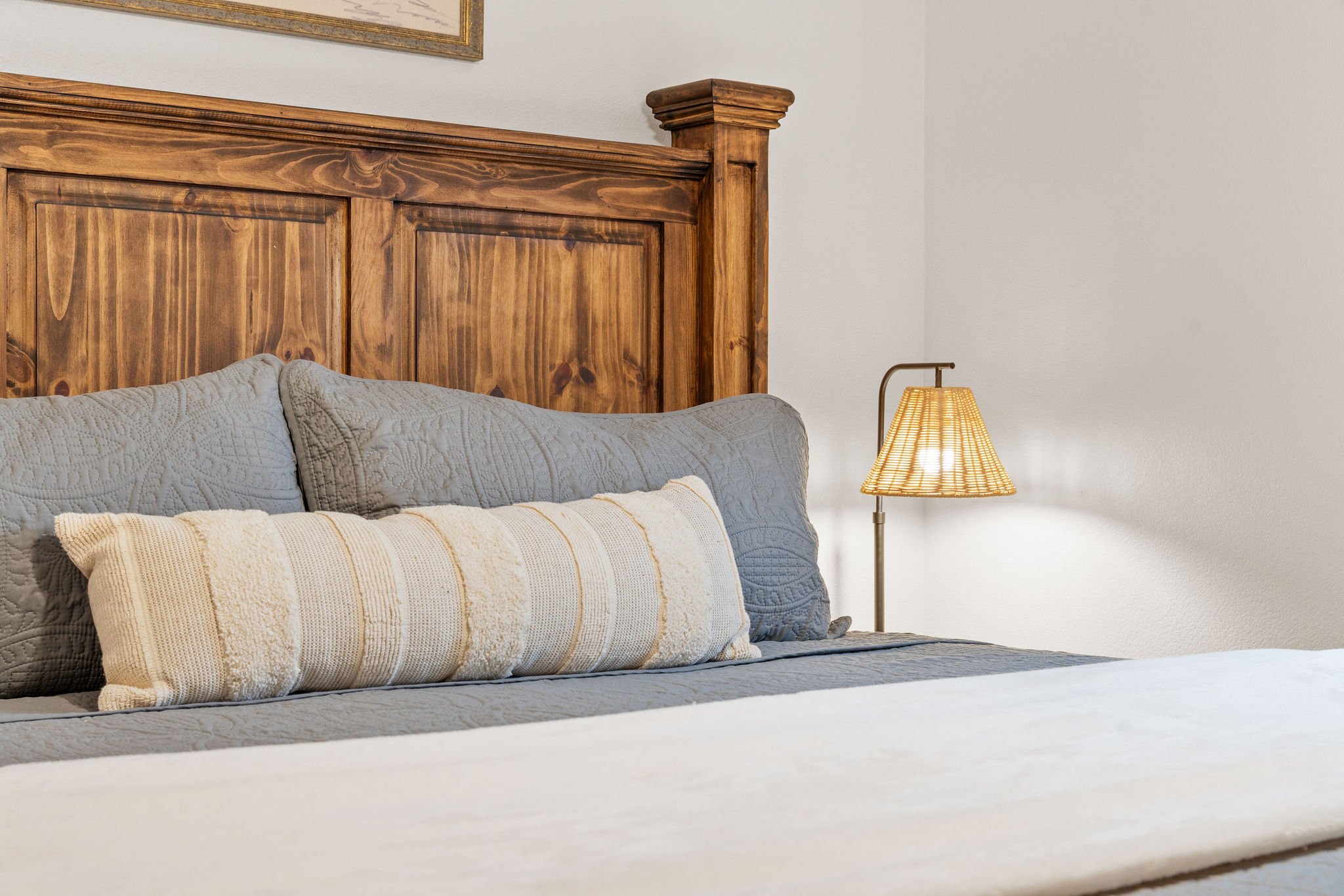 Bedroom detail with accent pillows