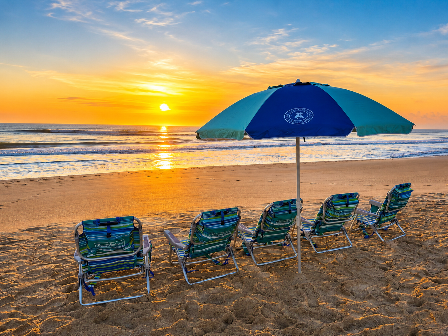 Chairs lined up, umbrella swaying, the ocean glowing gold—your family's front-row seats to the Atlantic await. Bring the kids, the cooler, and absolutely no agenda. Days like these, toes in the sand together, are what memories are made of.