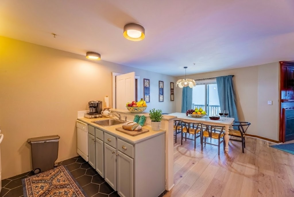 Enjoy the convenience of a fully-equipped kitchen and dine in style at the spacious dining table.