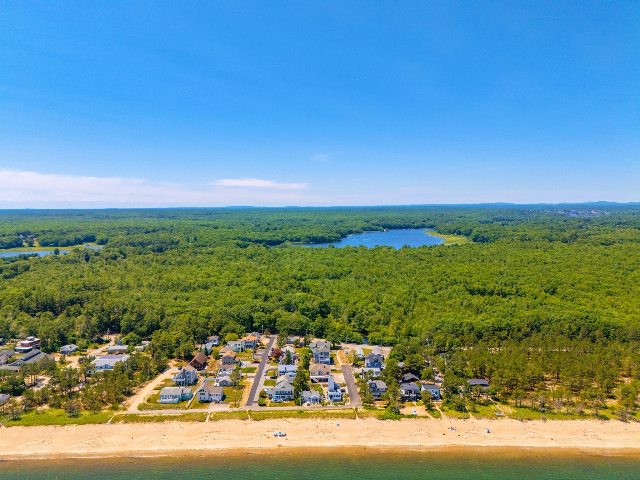 Soar high over Saco, ME, with aerial shots that highlight the area's natural beauty.