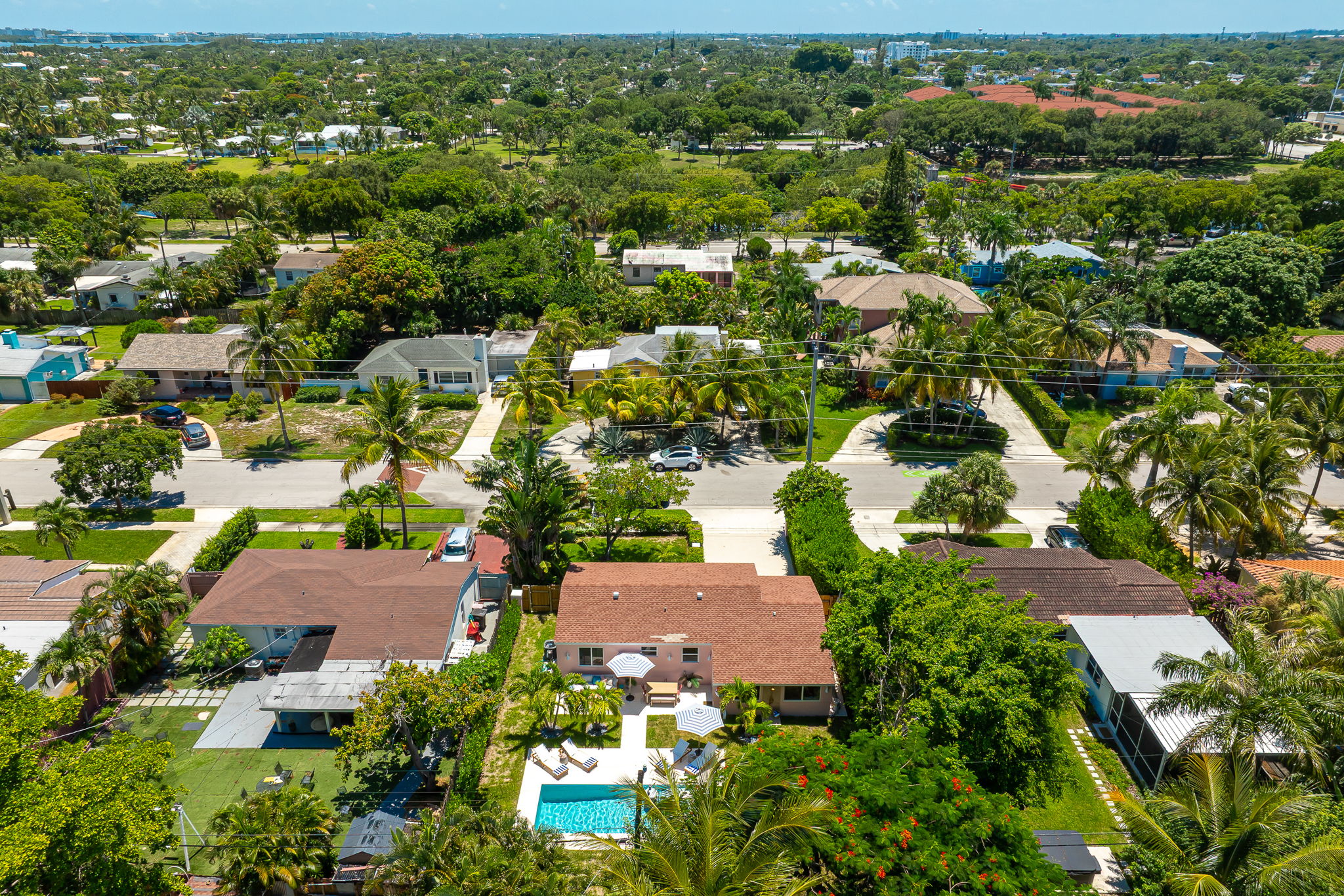 Aerial views of this SoSo West Palm Beach gem, nestled in a safe, family-friendly neighborhood just minutes from top beaches, dining, and amenities.