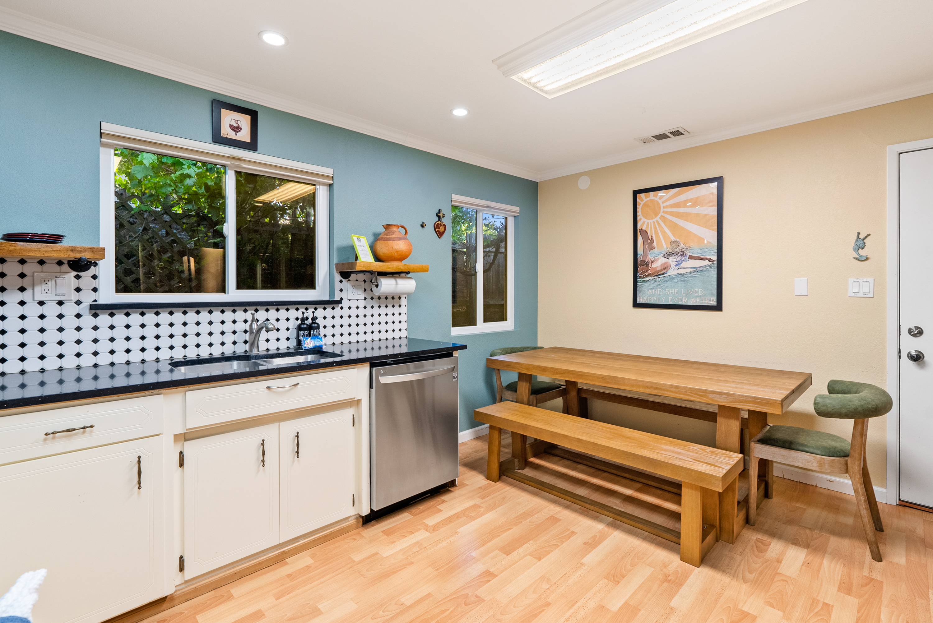 Gather for meals in this bright, open kitchen and dining area.