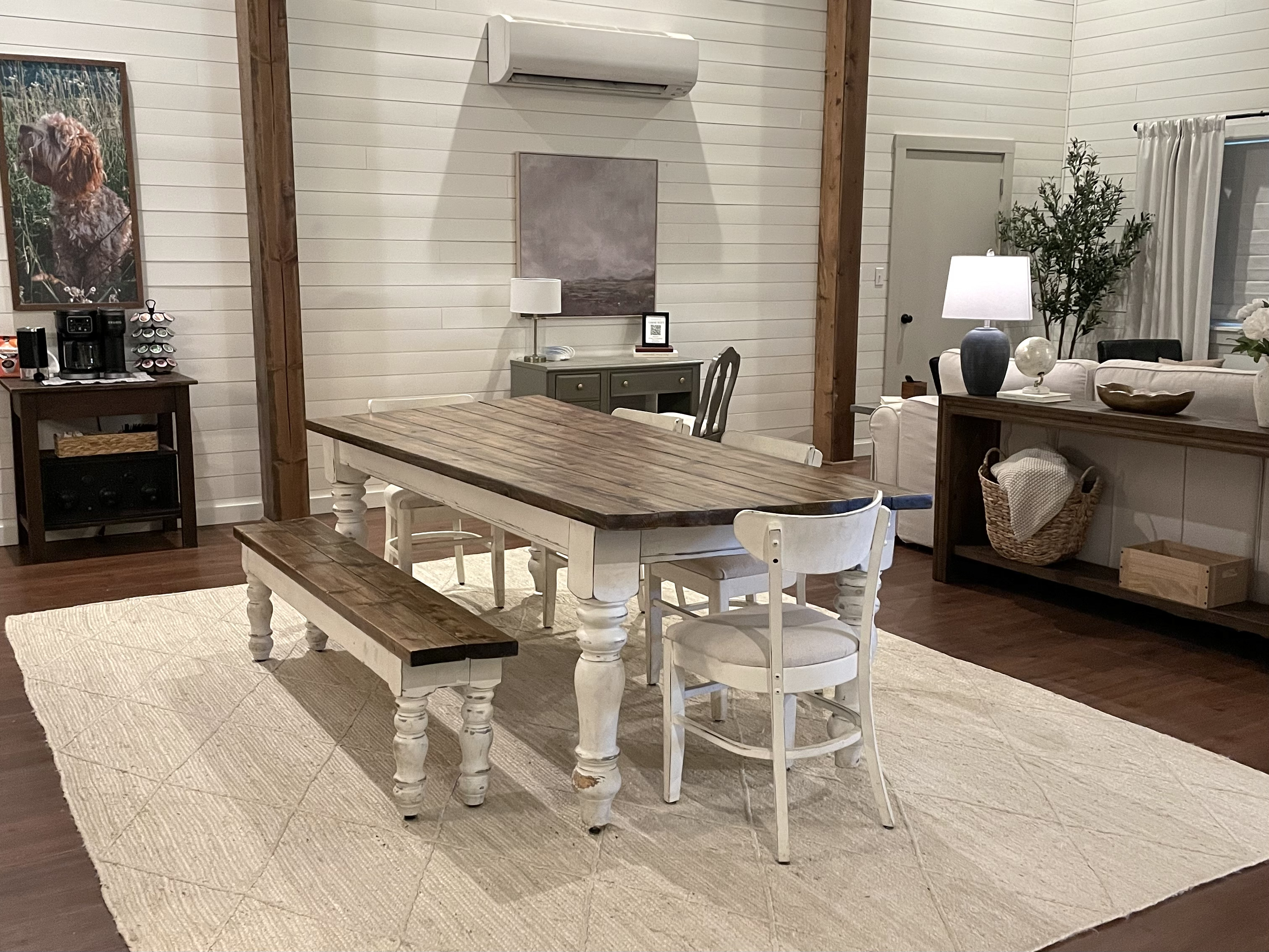 Spacious dining table with seating for everyone. Great for meals, games or morning coffee.