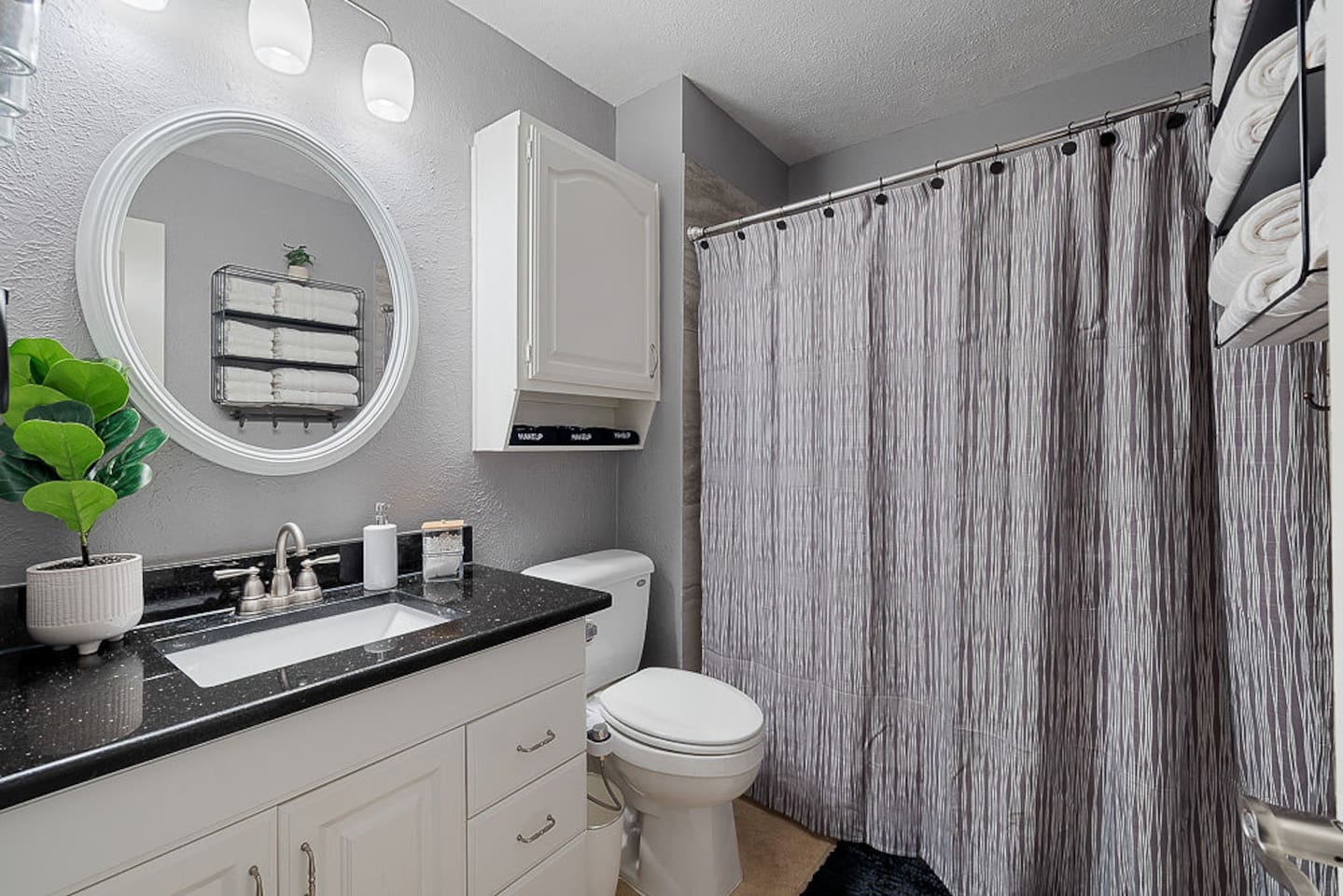 Enjoy this full bathroom with a shower and bathtub, fully equipped with fresh towels, makeup cloths, shower gel, and Terra Pure shampoo and conditioner for your relaxation