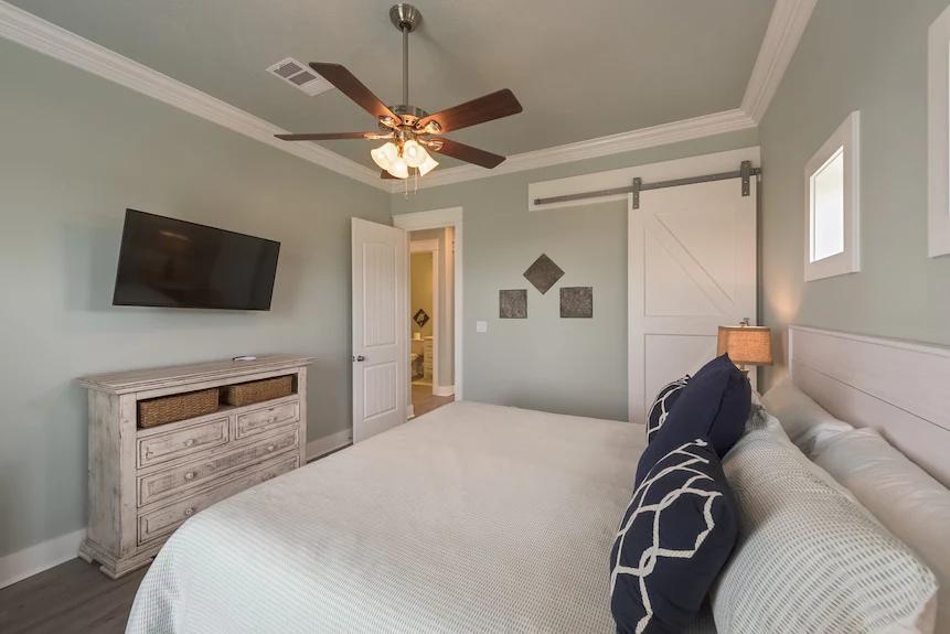 Breezy Point Bedroom 2: Spacious bedroom with a king-size bed, ideal for couples or guests seeking extra comfort.