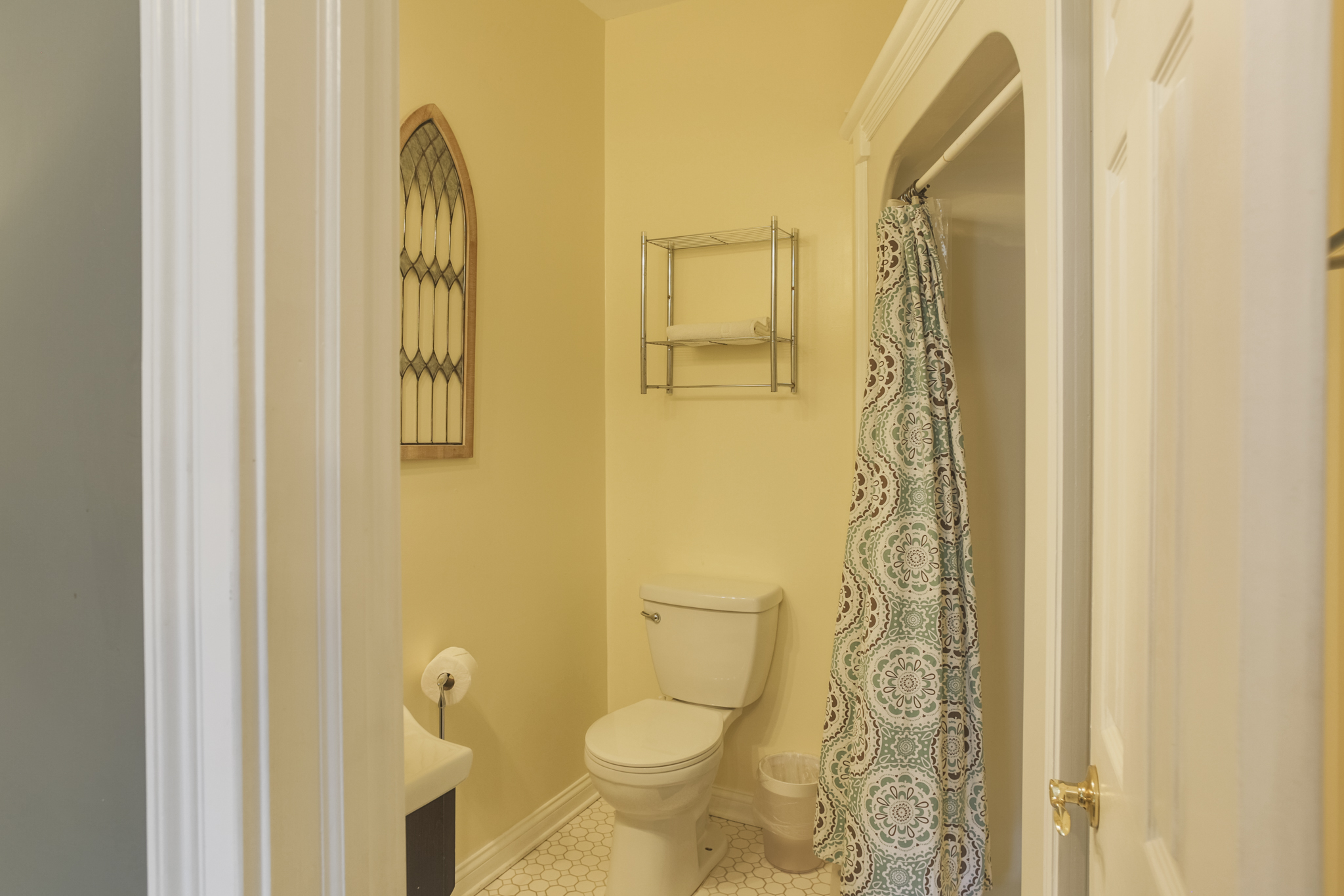 Enjoy the convenience of a spacious walk-in shower for a refreshing start or end to your day.