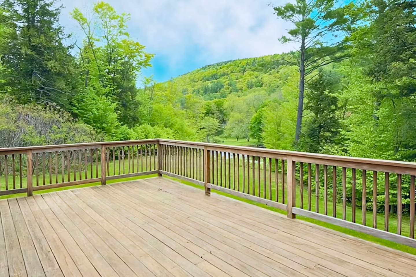 Big deck off dining room with lake view reading for a big cookout! 