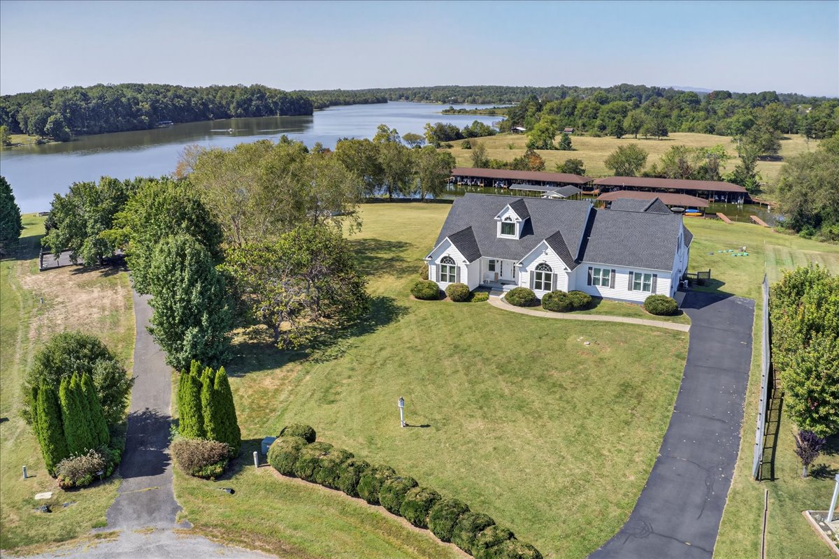 Charming curb appeal with a spacious front lawn.
