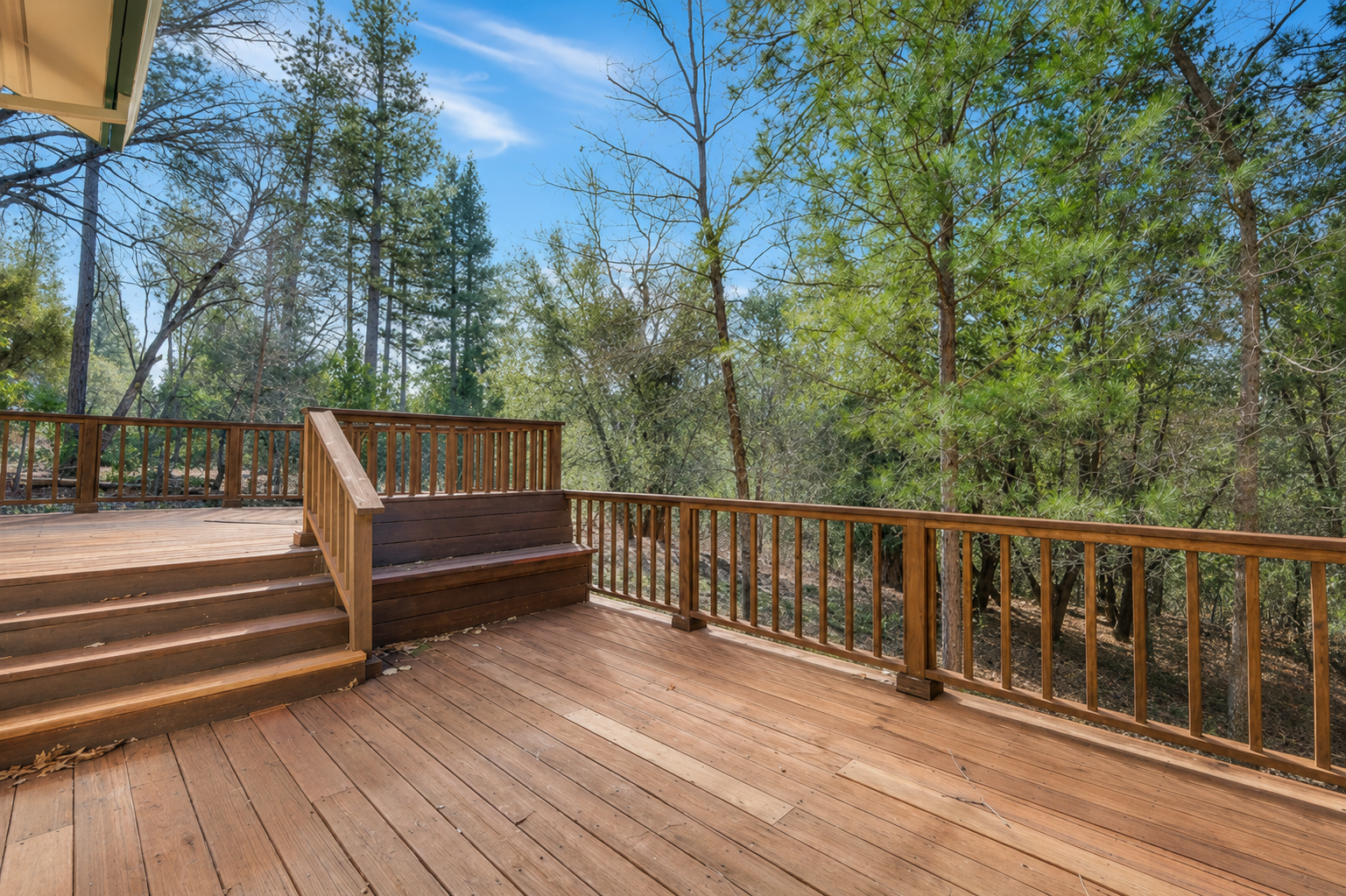 Beautiful terrace with Wood Views, outdoor space to unwind, and a quiet cabin setting surrounded by trees.