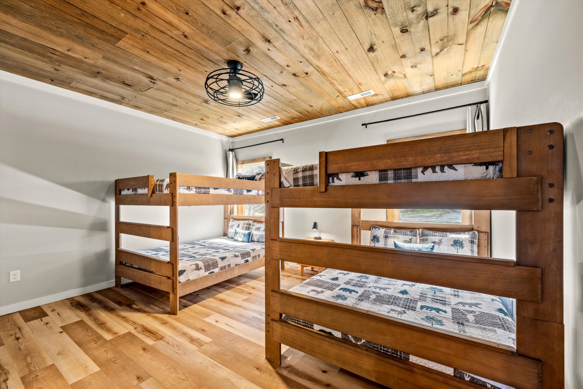 The queen-over-queen bunks provide sleeping for up to 8 guests.
