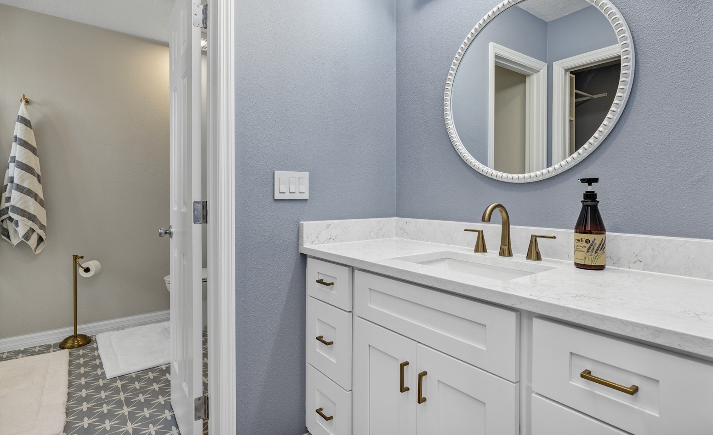 Master Bathroom with walk in shower and hand held shower wand