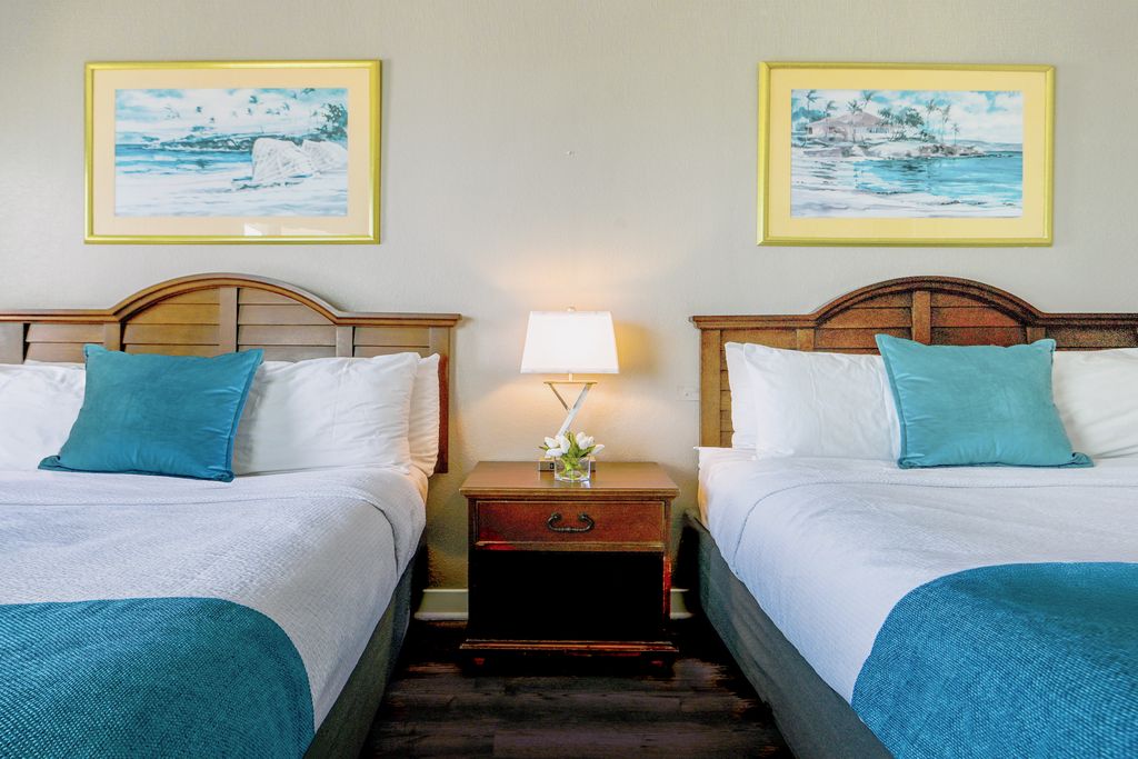 Retreat to an oceanfront haven, where the charm of the beds meets the allure of the sea, providing a delightful setting for a rejuvenating stay.