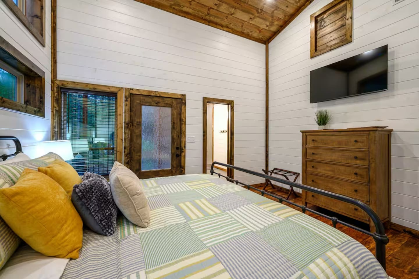 Rest easy in plush bedding and blackout shades—your private forest sanctuary awaits.