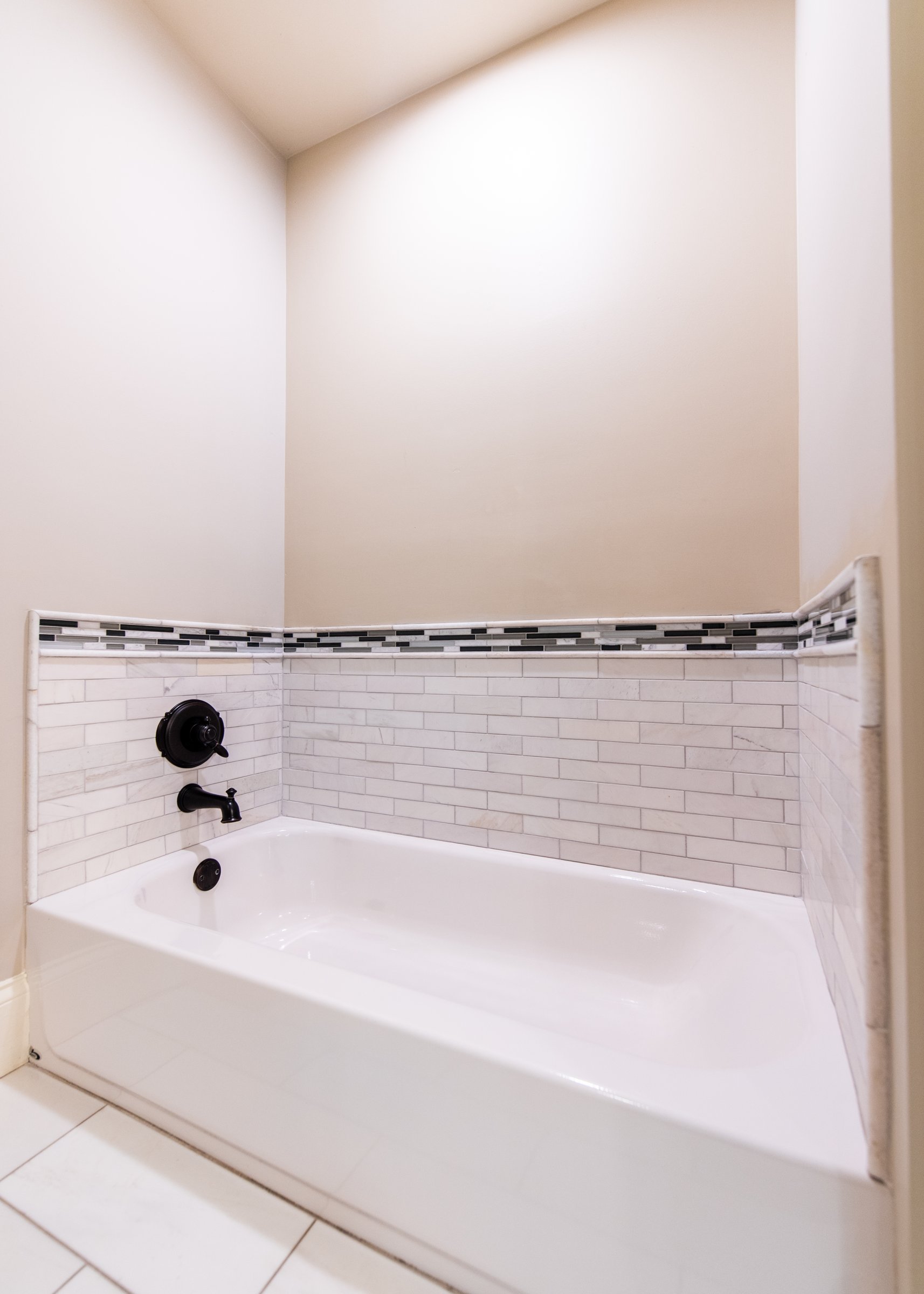 A deep soaking tub for unwinding after a day exploring Norton Commons.