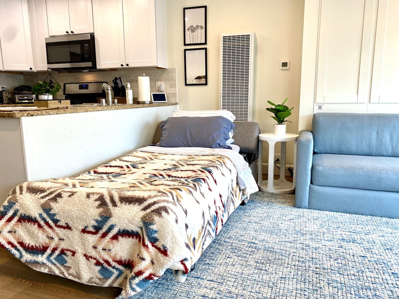 Sleeper ottoman opens to a twin bed