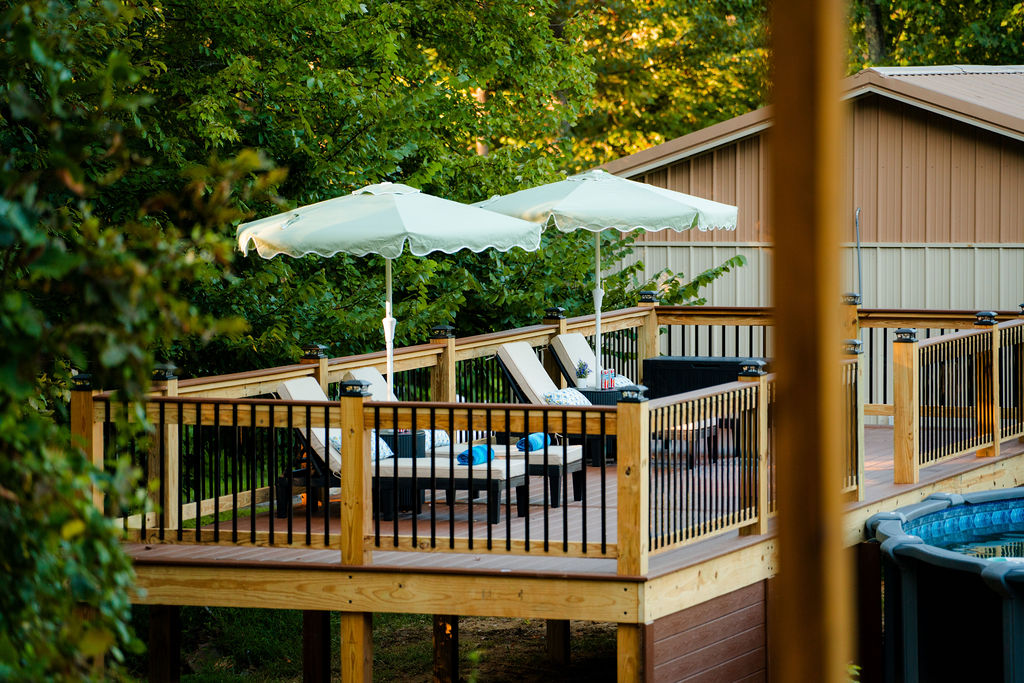 Your private outdoor retreat - pond, pool, sauna, sunshine, and wooded surroundings.