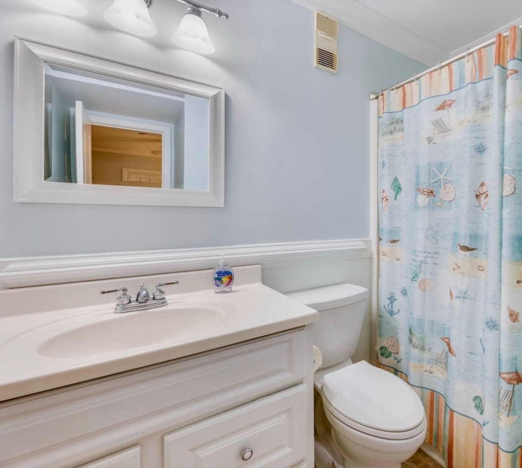 Second bathroom with tub and shower