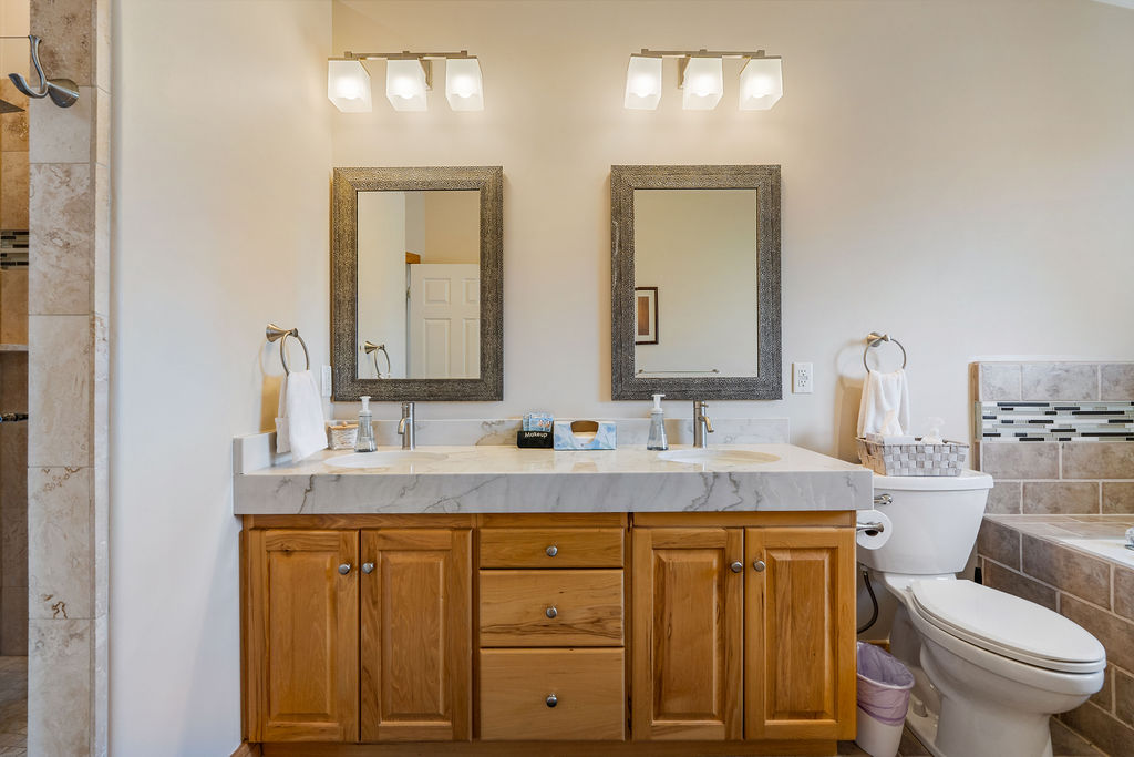 The updated master bath with dual vanity 