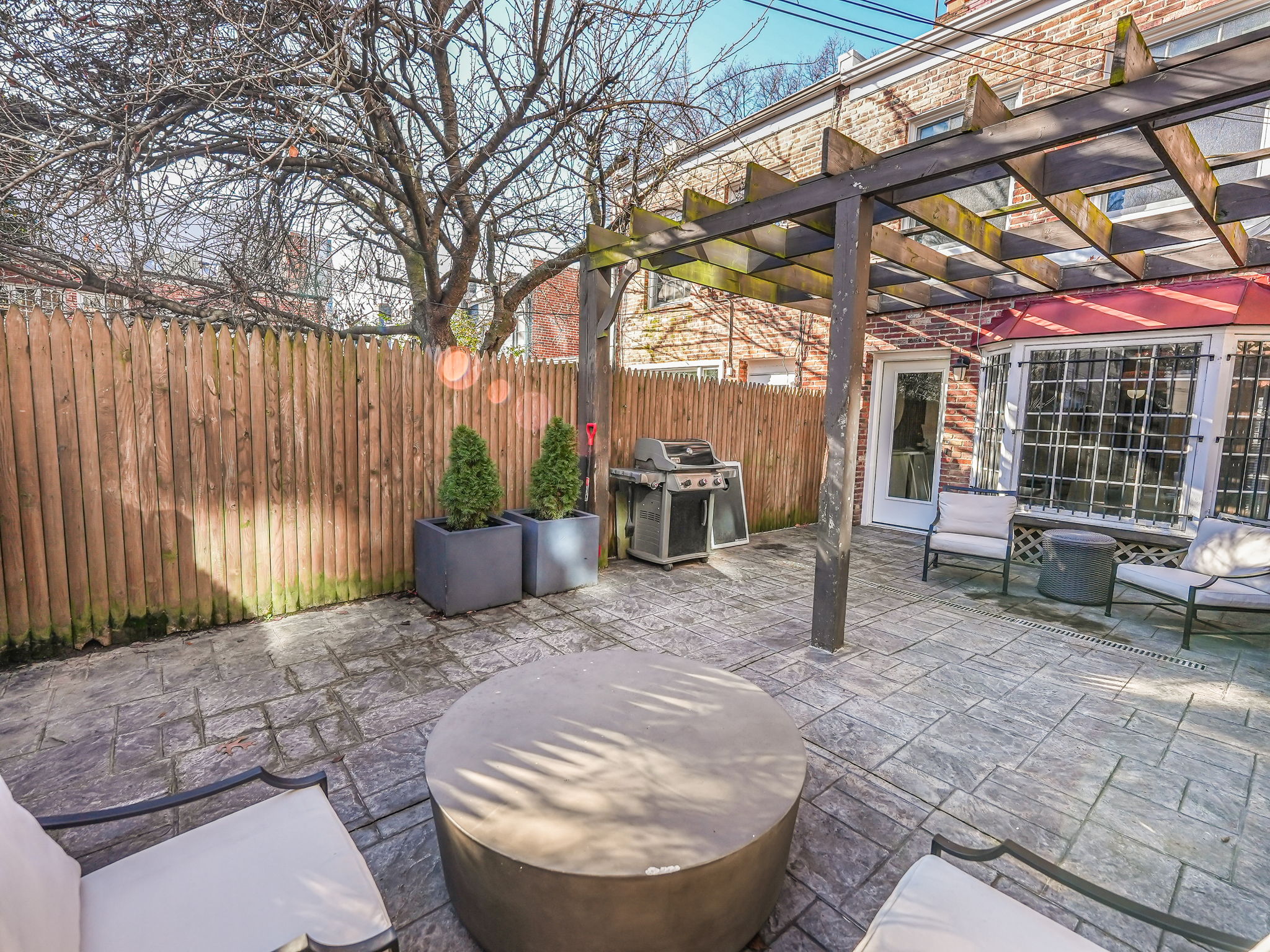 Private Patio: Weber Grill, Restoration Hardware Seating & Table, Cornhole.