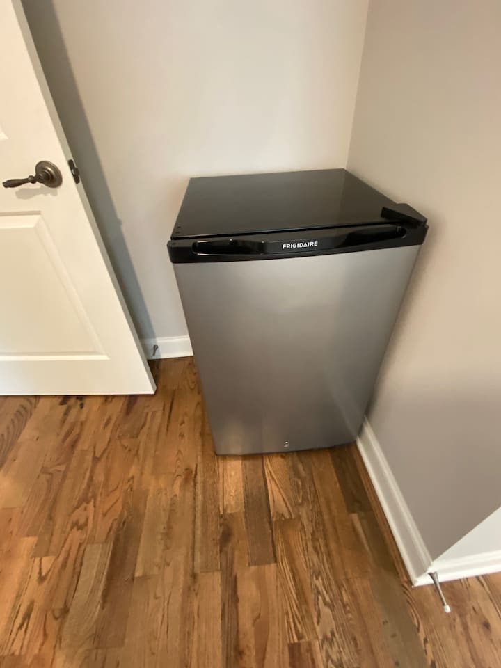 Small refrigerator in all of the main bedrooms. Look in the walk in closets if you can't find it out in the open.