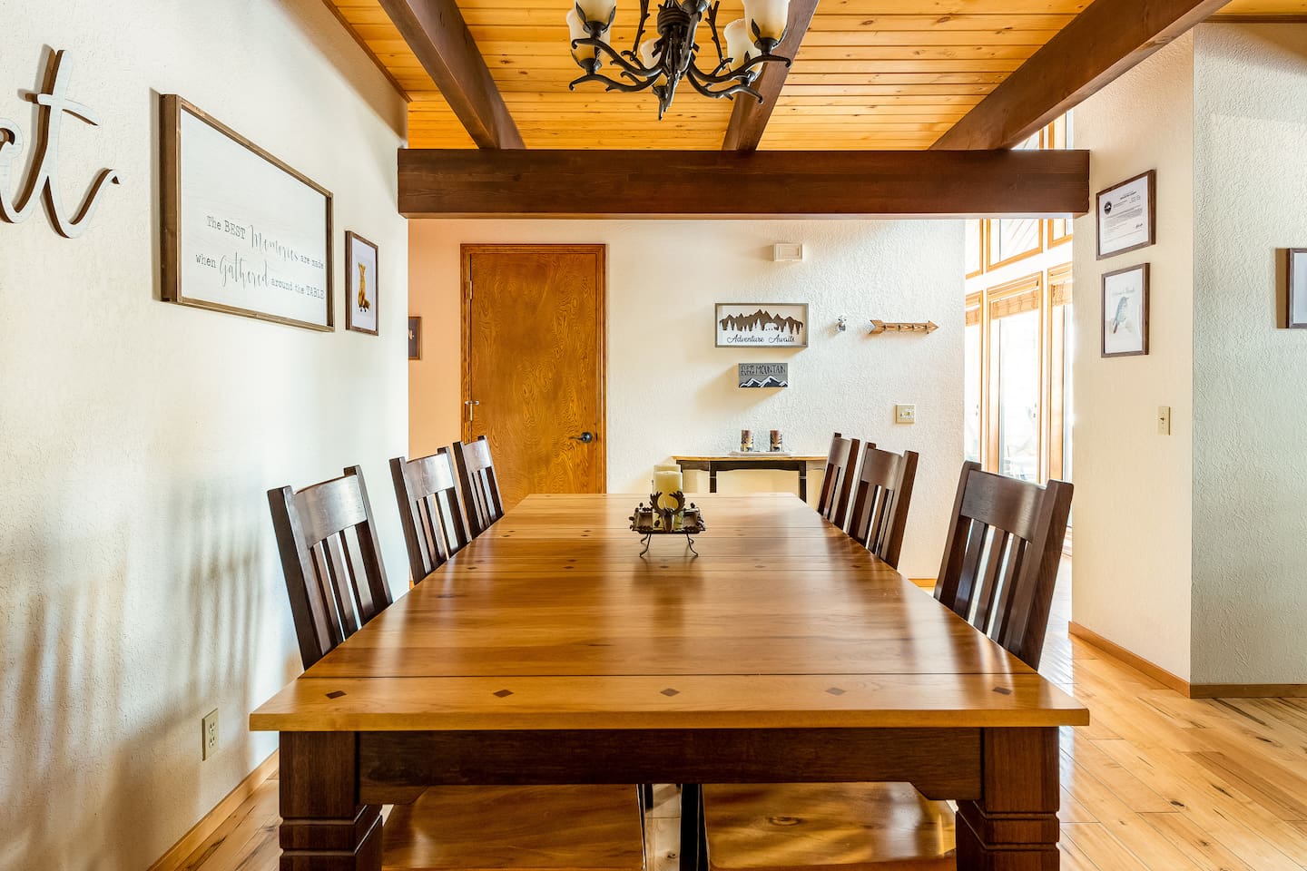 The dining room features 6 chairs plus 2 benches (seat 2 adults or 3 kids each) plus there are 3 barstools at the kitchen bar (for a natural "kids table"). There are additional chairs in the garage if needed. 