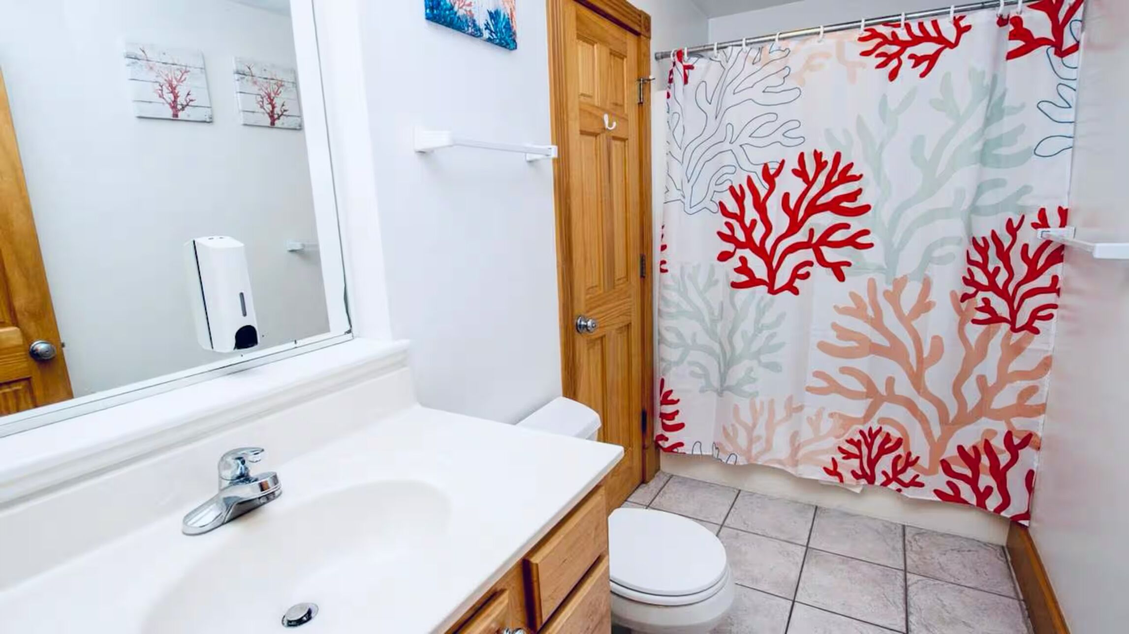 Bathroom 2 with coral theme.