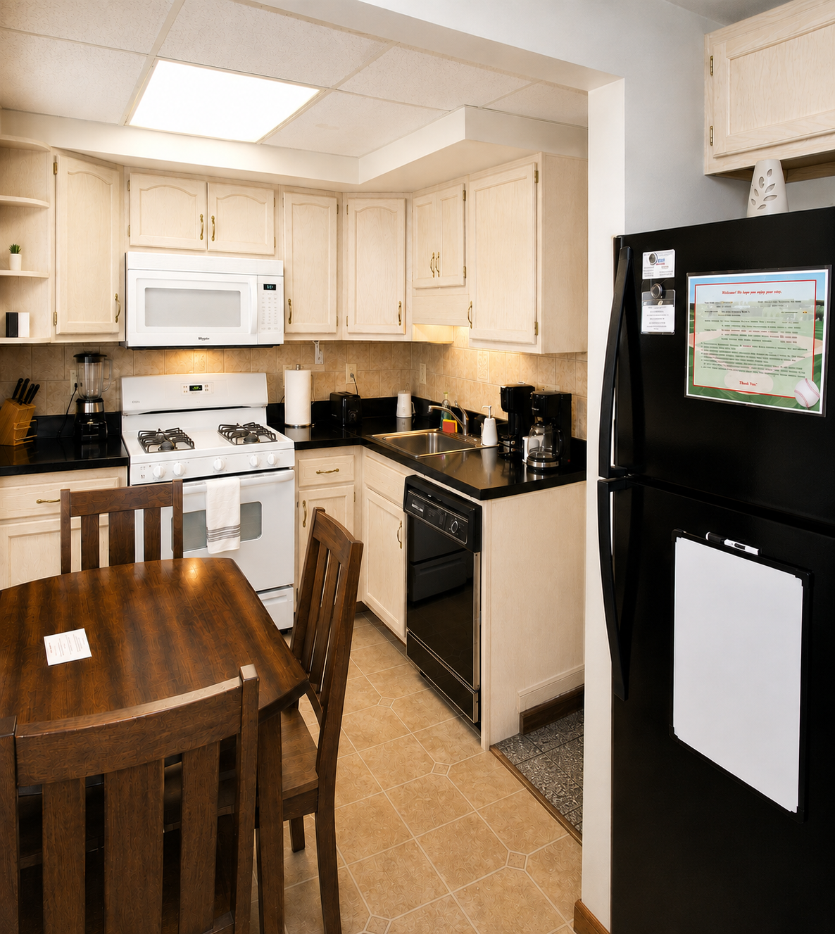 Eat in kitchen with a full size refrigerator with automatic icemaker and dishwasher.